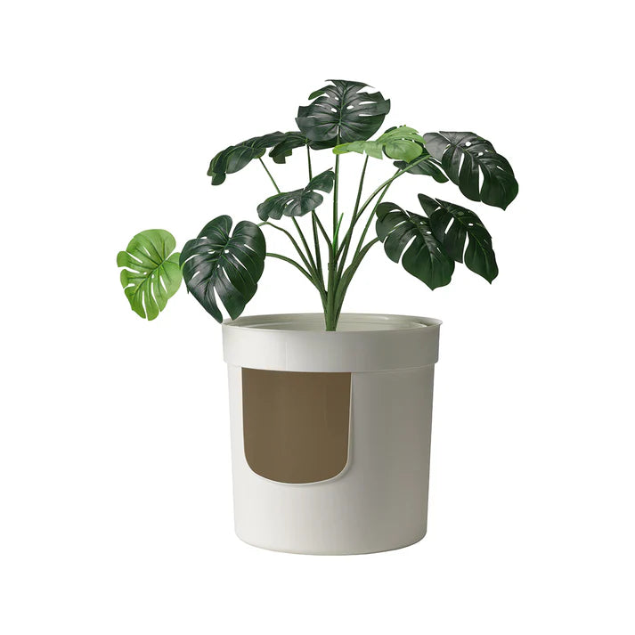 MODERNA Hidden Planter est une caisse à chat fermée ressemblant à un vrai pot de fleur.
